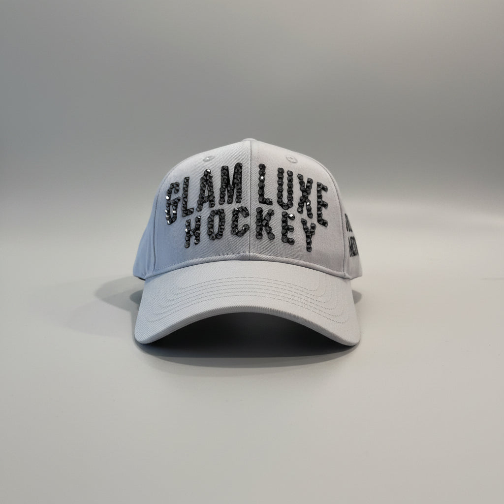 Glam Luxe Hockey Cap with hematite rhinestone lettering on black vinyl base — front view