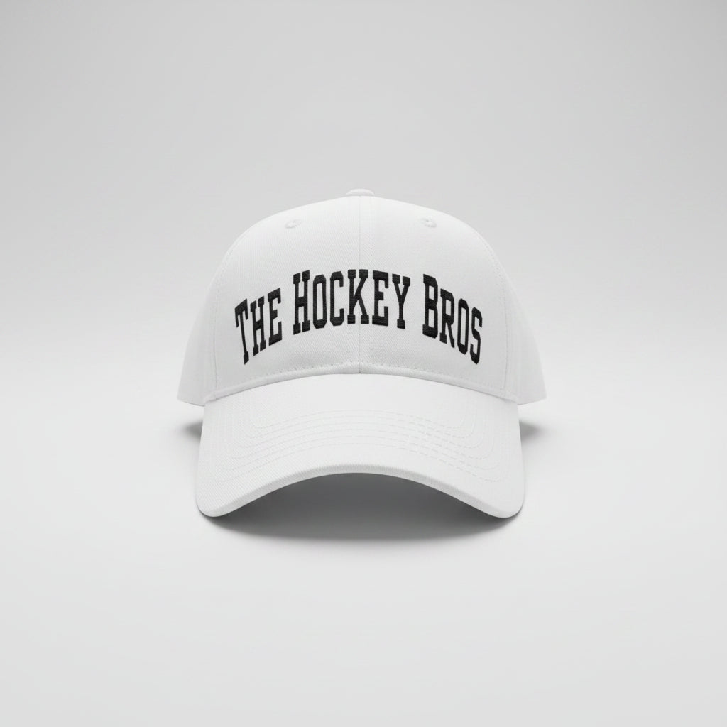 The Hockey Bros™ Classic Edition Cap. Structured boys hockey cap in white with black vinyl lettering, kids and adult sizes