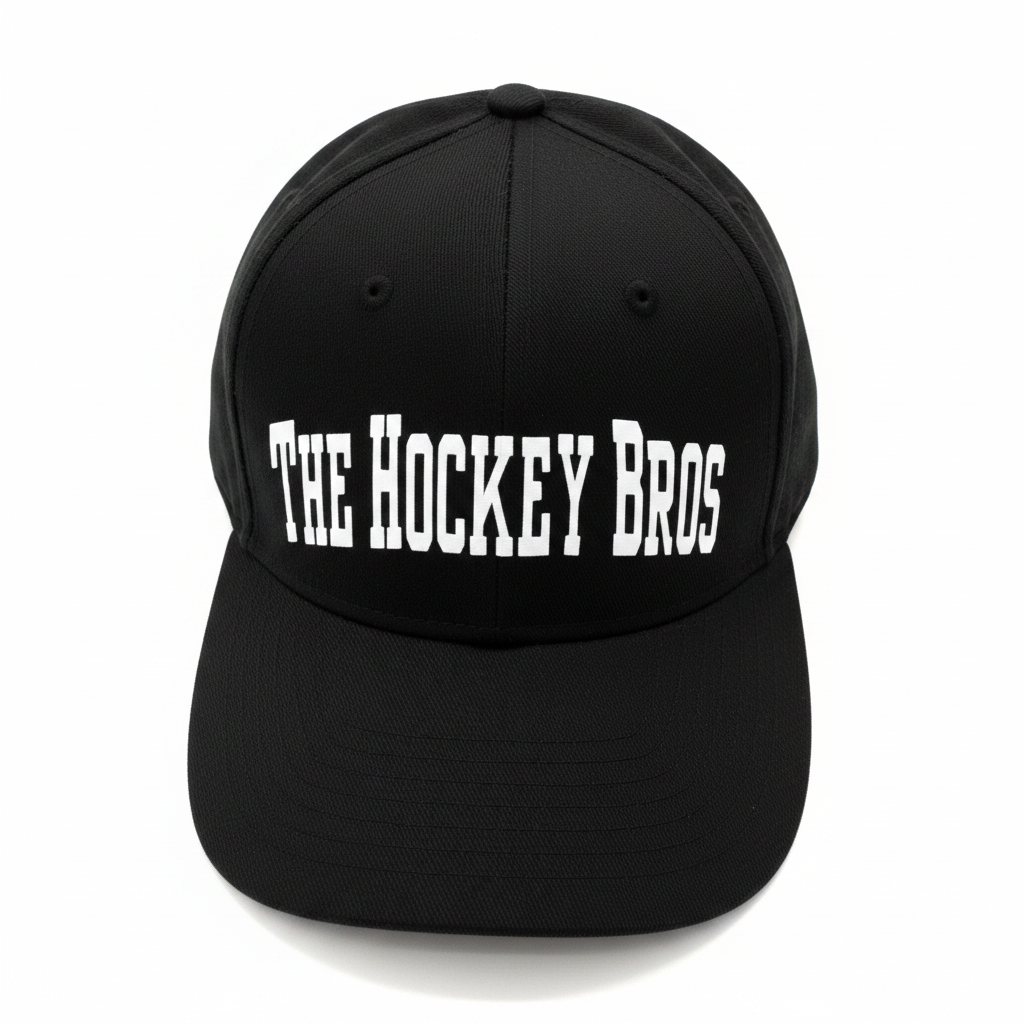 The Hockey Bros™ Classic Edition Cap — boys hockey cap in black with white vinyl lettering, adjustable fit