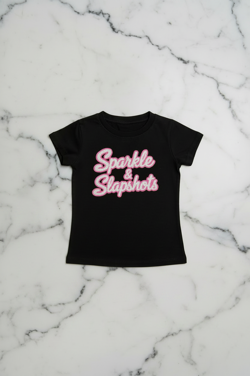 Sparkle & Slapshots - She's got game