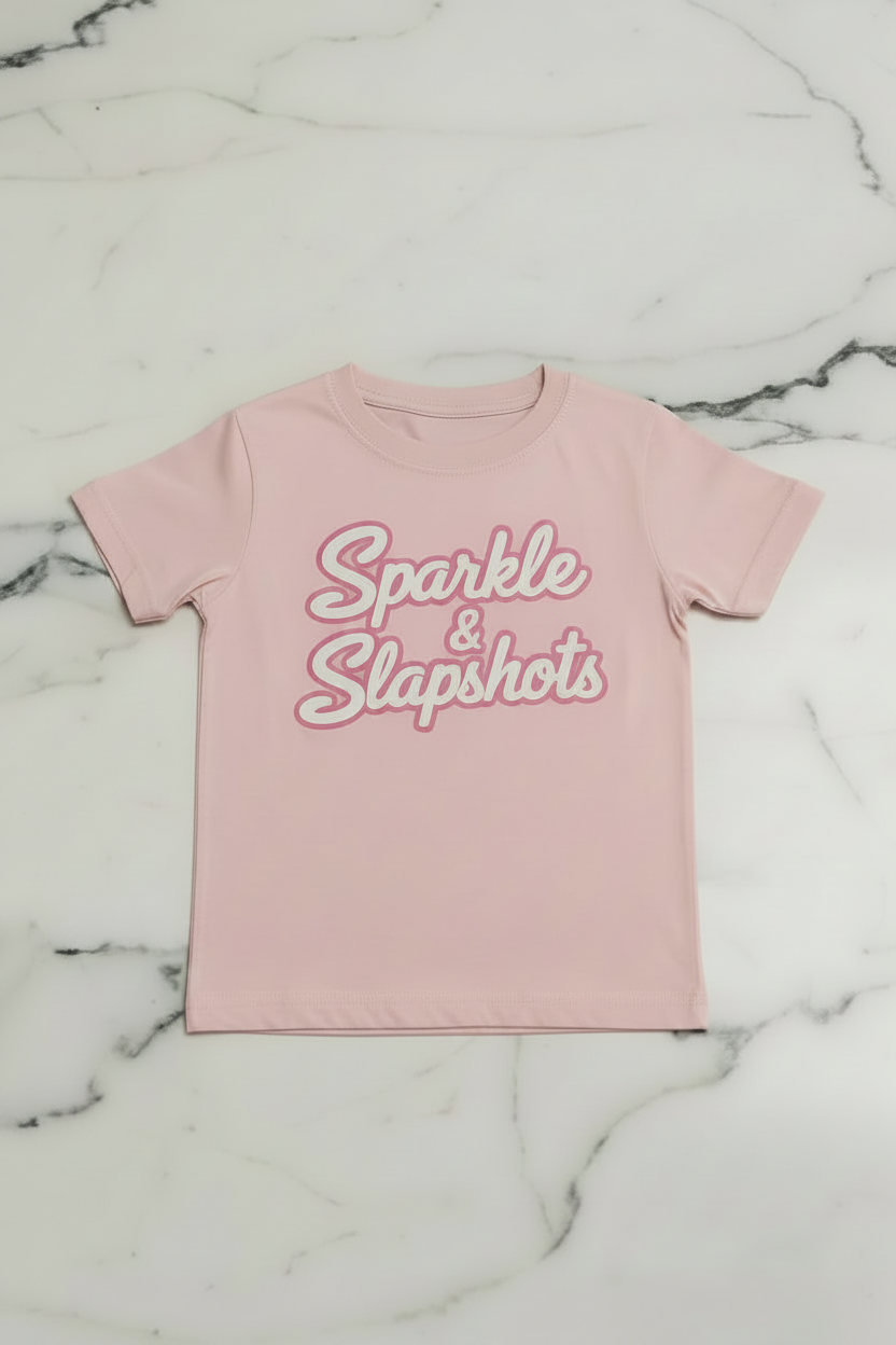 Sparkle & Slapshots Design Co. She's got game